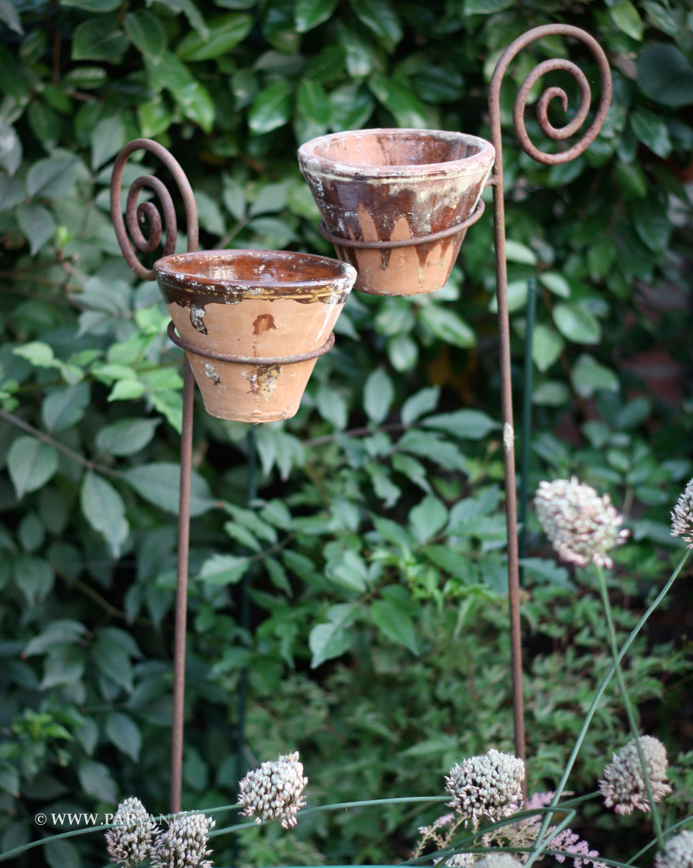 Steker-ijzer-met-harspot-kaars-tuin